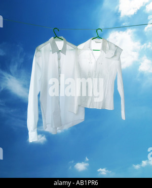 two white shirts on a washing line Stock Photo