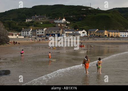 people on the sandy beach at Llangrannog village Cardigan Bay Ceredigion west wales Stock Photo