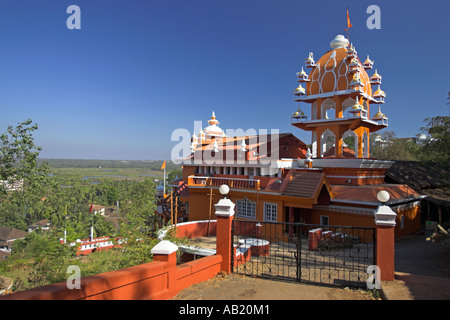 Orange Maruti Temple dedicated to Hindu monkey god Hanuman overlooks Panjim from Altinho hillside Goa India Stock Photo