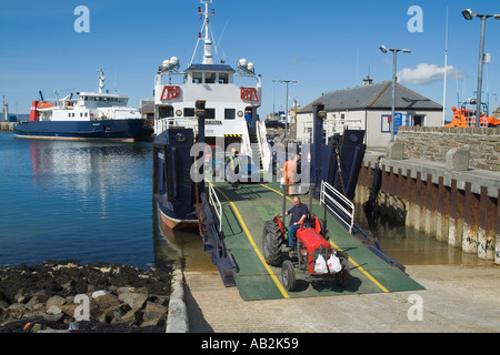 dh Kirkwall harbour KIRKWALL ORKNEY Red Massey Ferguson tractor loading onto MV Shapinsay Shapinsay ferry slipway dh Kirkwall harbour KIRKWALL ORKNEY Red Massey Ferguson tractor loading onto MV Shapinsay Shapinsay ferry slipway