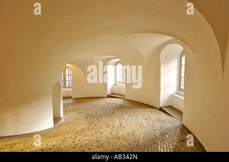 The interior of the Round Tower in Copenhagen Denmark. The tower has no staircase but rather a paved spiral walkway. Stock Photo