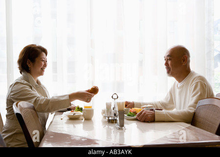 Senior couple having breakfast Stock Photo