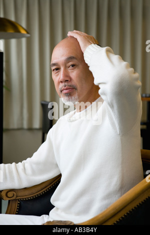 Senior man looking at camera Stock Photo