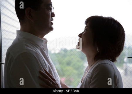 Mature couple looking at each other Stock Photo