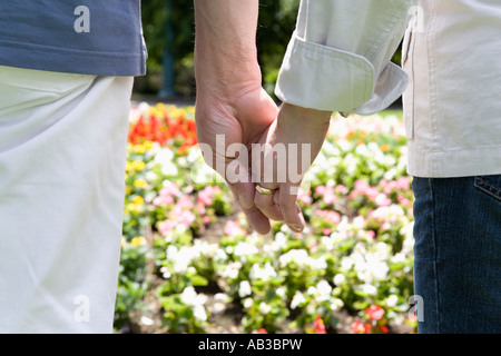 Senior couple holding hands Stock Photo