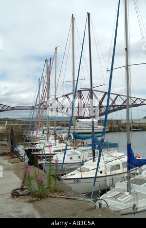 View of Yacht Harbour and Forth Rail Bridge Firth of Forth Queensferry Edinburgh Scotland United Kingdom UK Stock Photo