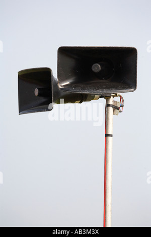 public pa address system speakers on a metal pole Stock Photo
