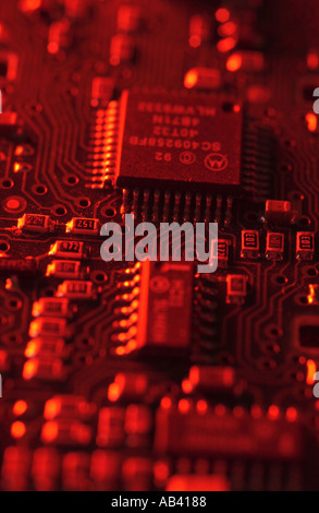 Electronic computer circuit Board with red light Stock Photo