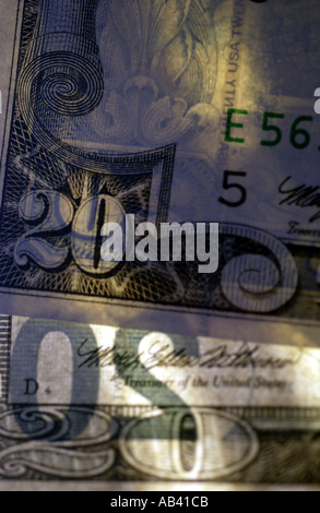 Twenty dollar bills form a collage with bright light streaming through bills Stock Photo