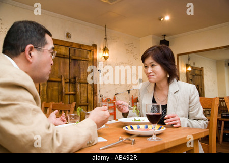 Mature couple dining in restaurant Stock Photo