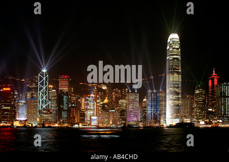 A night view of skyscrapers on Hong Kong Island over Victoria Harbour with the IFC building (tallest in Hong Kong) left. Stock Photo