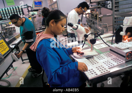 A worker at the Delphi Automotive maquiladora in Ciudad Juarez ...