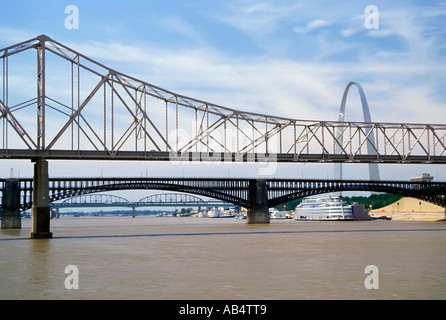 Three bridges cross the Mississippi River at St Louis Missouri MO with the Arch in the background Stock Photo