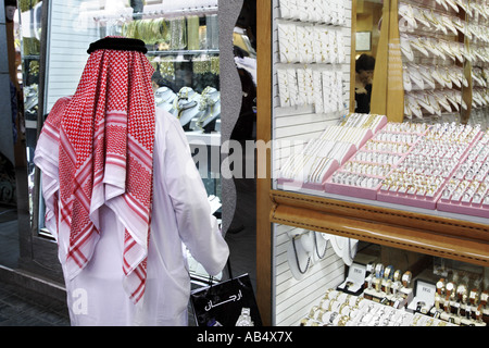 arab man in the gold souk, Dubai Stock Photo