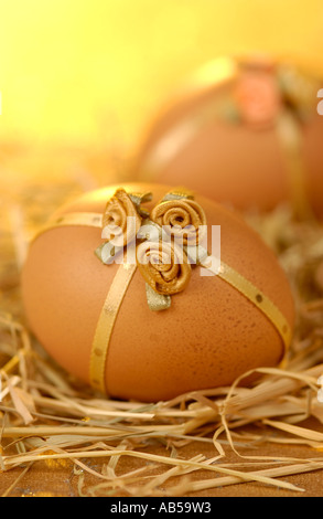 Decorated chicken eggs laying in a nest Stock Photo