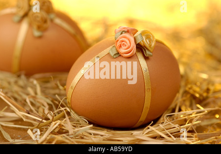 Decorated chicken eggs in a nest Stock Photo