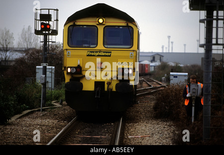 freight train driver asking for permission to proceed at a red signal, port of Felixstowe, Suffolk, UK. Stock Photo