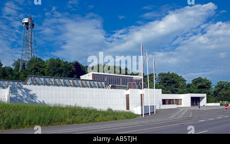 Nordjyllands Kunstmuseum Kunsten with Aalborgtaarnet (The Aalborg Tower) in the background Stock Photo