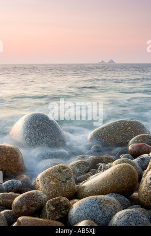 Sunset On Wet Boulders Near Nanjulian Cove Cornwall Uk Stock Photo - Alamy