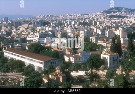 The Archaeological Park, Stoa of Attalos, Church of Agii Apostoli Holy Apostles, and modern city, Athens, Greece. Stock Photo