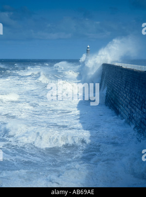 Waves breaking over Tynemouth breakwater, Tynemouth, Tyne & Wear, England, UK. Stock Photo