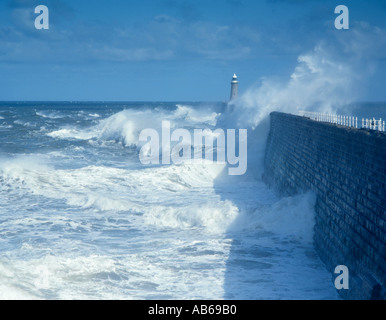 Waves breaking over a breakwater; Tynemouth breakwater, Tynemouth, Tyne Wear, England, UK. Stock Photo