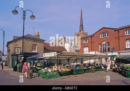 Farmers market in the centre of stowmarket overlooked by the spire of ...