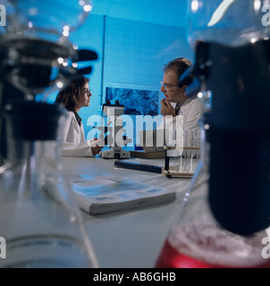 Laboratory technicians in discussion at water treatment plant, Izmit, Turkey, Stock Photo
