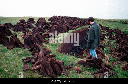 Peat casting at Yell Shetland Islands Scotland UK Great Britain Peat casting at Yell Shetland Islands Scotland UK Great Britain