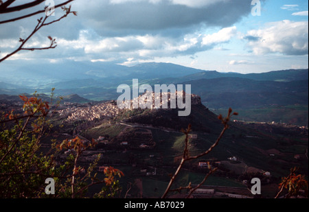 Evening at Calascibetta a small town perched on a hill in Sicily seen from the town of Enna Stock Photo