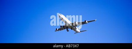 Commercial Airplane approaching YVR Vancouver International Airport in Richmond British Columbia Canada Stock Photo