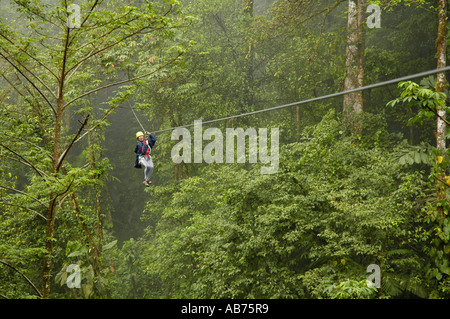 Tourist arriving to platform on a canopy cable ride, Monteverde, Santa  Elena, Costa Rica, Central America Stock Photo - Alamy