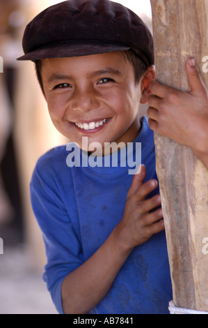 A young shepherd boy at the Kashgar Sunday Market on the Silk Road Stock Photo