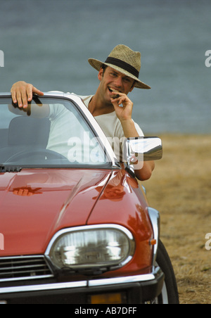 Man in convertible Stock Photo