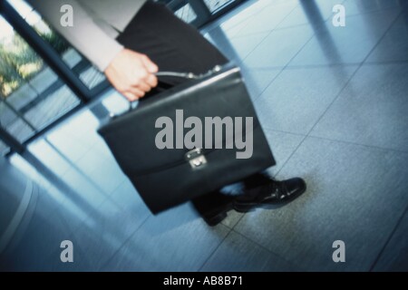 Man carrying briefcase Stock Photo