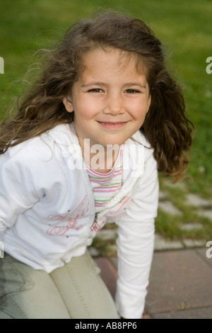 Beautiful six year old girl smiling sweetly Stock Photo