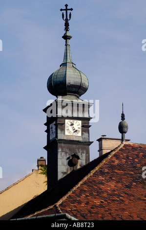 The onion shape of the clock tower of Old town hall in Buda Castle district Budapest Hungary Stock Photo