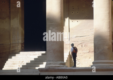 rucksack tourist in rock city Ptra, at the entrance to Al Khazneh, Jordan, Ptra. Stock Photo