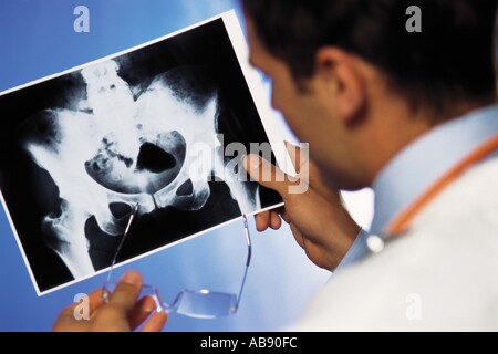 Doctor checking x-ray Stock Photo