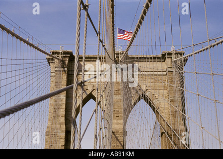 Brooklyn bridge NYC New York City USA America suspension cables flag bricks mortar unique Stock Photo