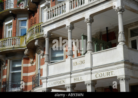 Close up detail of ornate red brick apartment building at Campden Hill Court Kensington London Stock Photo