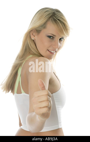 blond woman holding thumbs up. Stock Photo