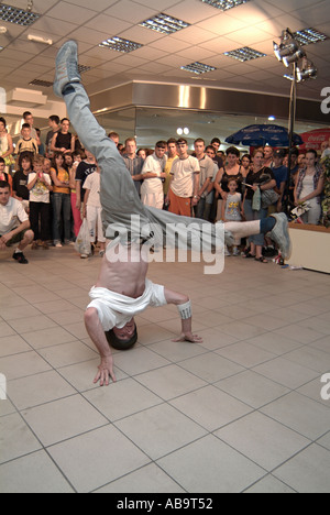 Breakdancer Entertains the Public at a Shopping Mall Stock Photo
