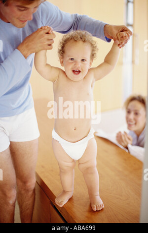 Baby's first steps Stock Photo