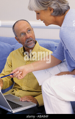 Couple working together Stock Photo