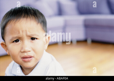 Boy looking worried Stock Photo