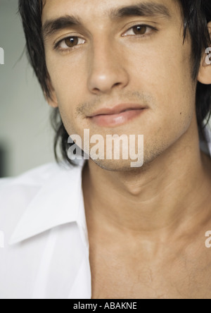 Man wearing unbuttoned dress shirt, close-up Stock Photo