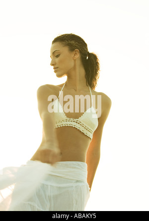 Woman wearing bikini top and skirt Stock Photo