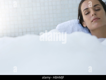 Woman in bubble bath Stock Photo