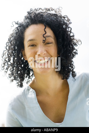 Young woman smiling, portrait Stock Photo